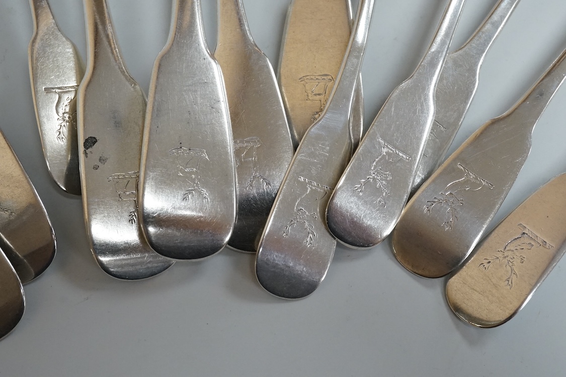 A set of six late George III Irish silver fiddle pattern table spoons and six matching dessert spoons, Philip Weekes, Dublin, 1818, 20.6oz.